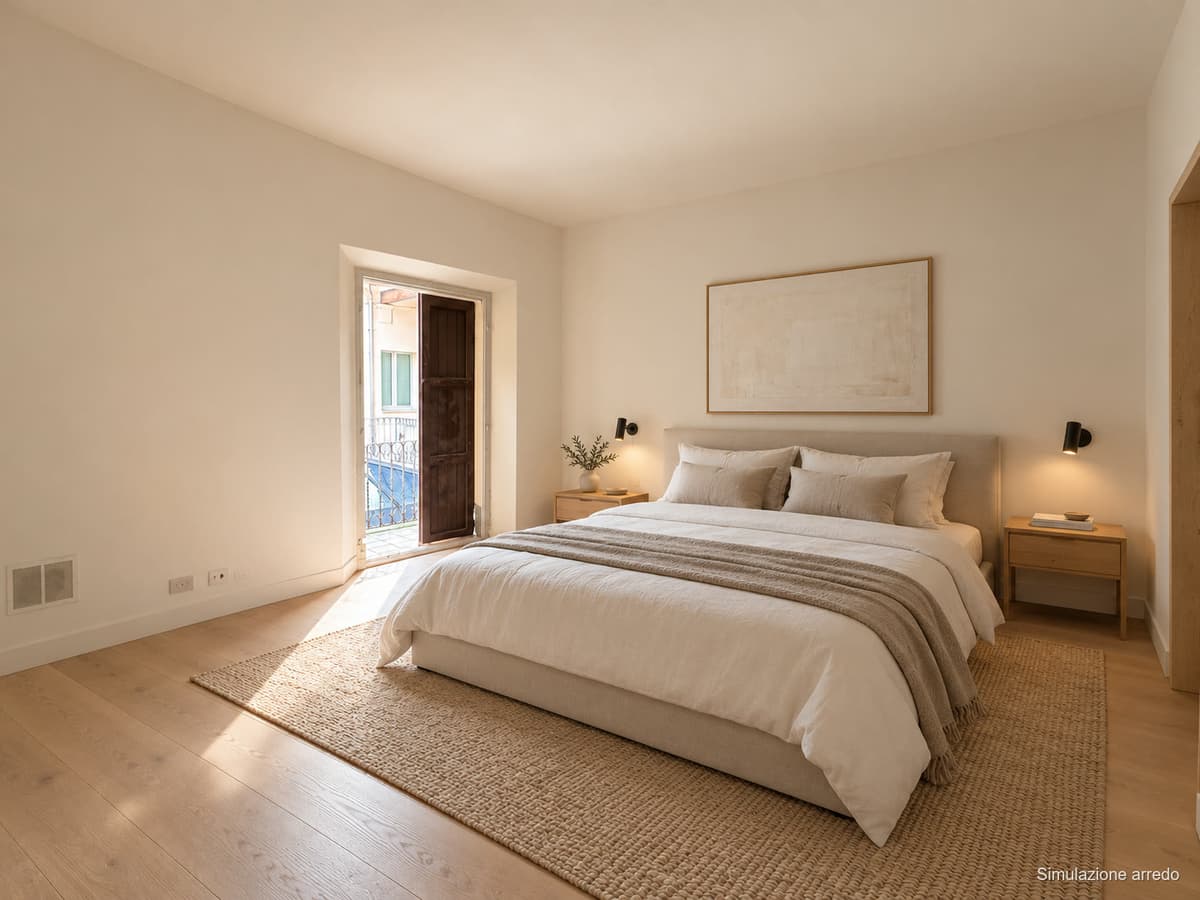 La camera matrimoniale con porta-finestra (simulazione) — Appartamenti in vendita a Palazzo Denaglia, centro storico di Reggio Emilia
